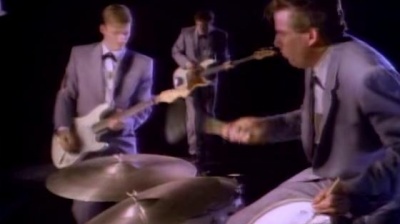 Chris Isaak - You Owe Me Some Kind Of Love